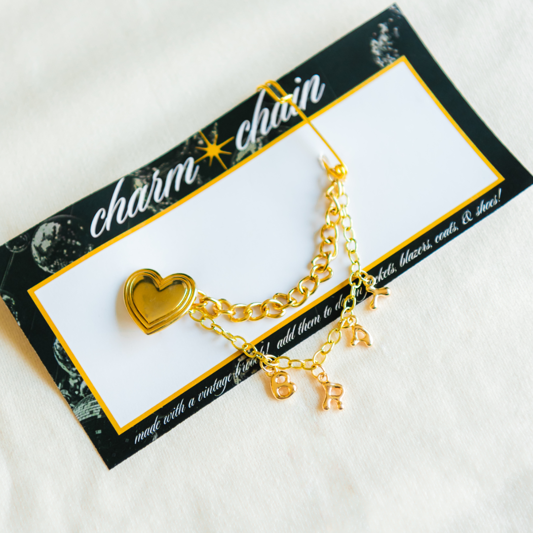 brat // charm chain with brooch