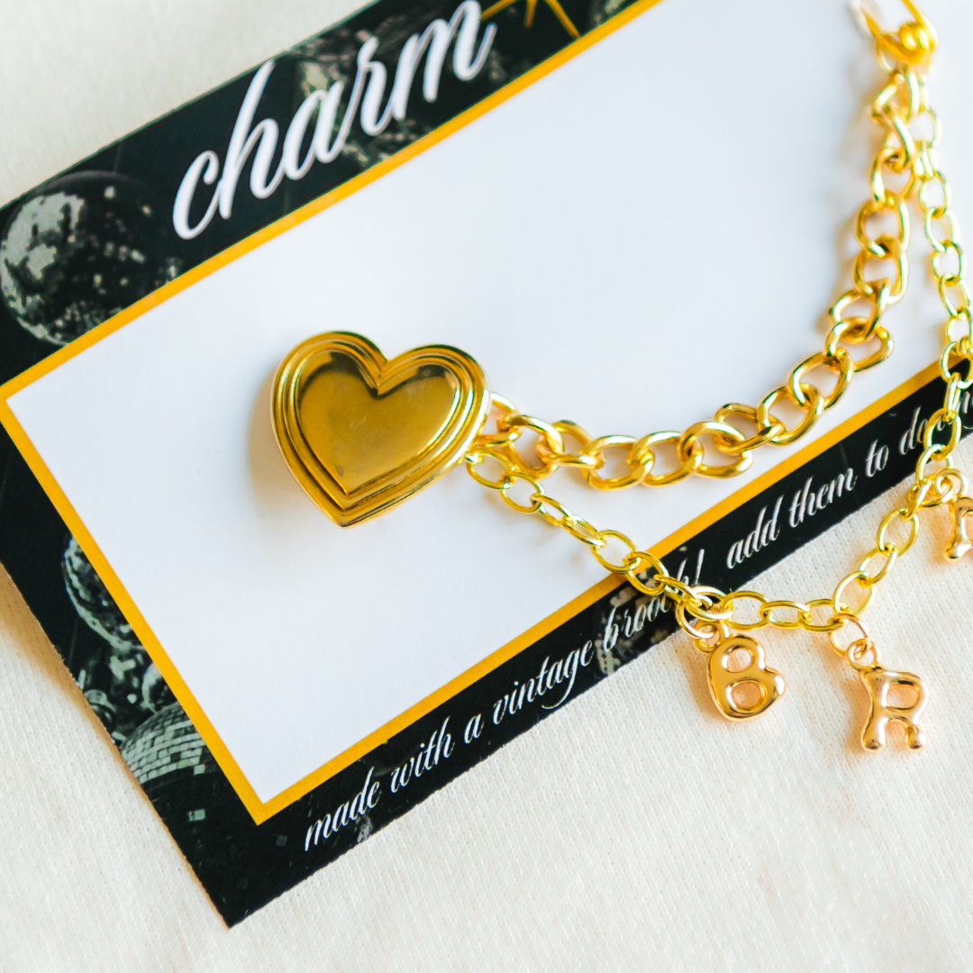 brat // charm chain with brooch